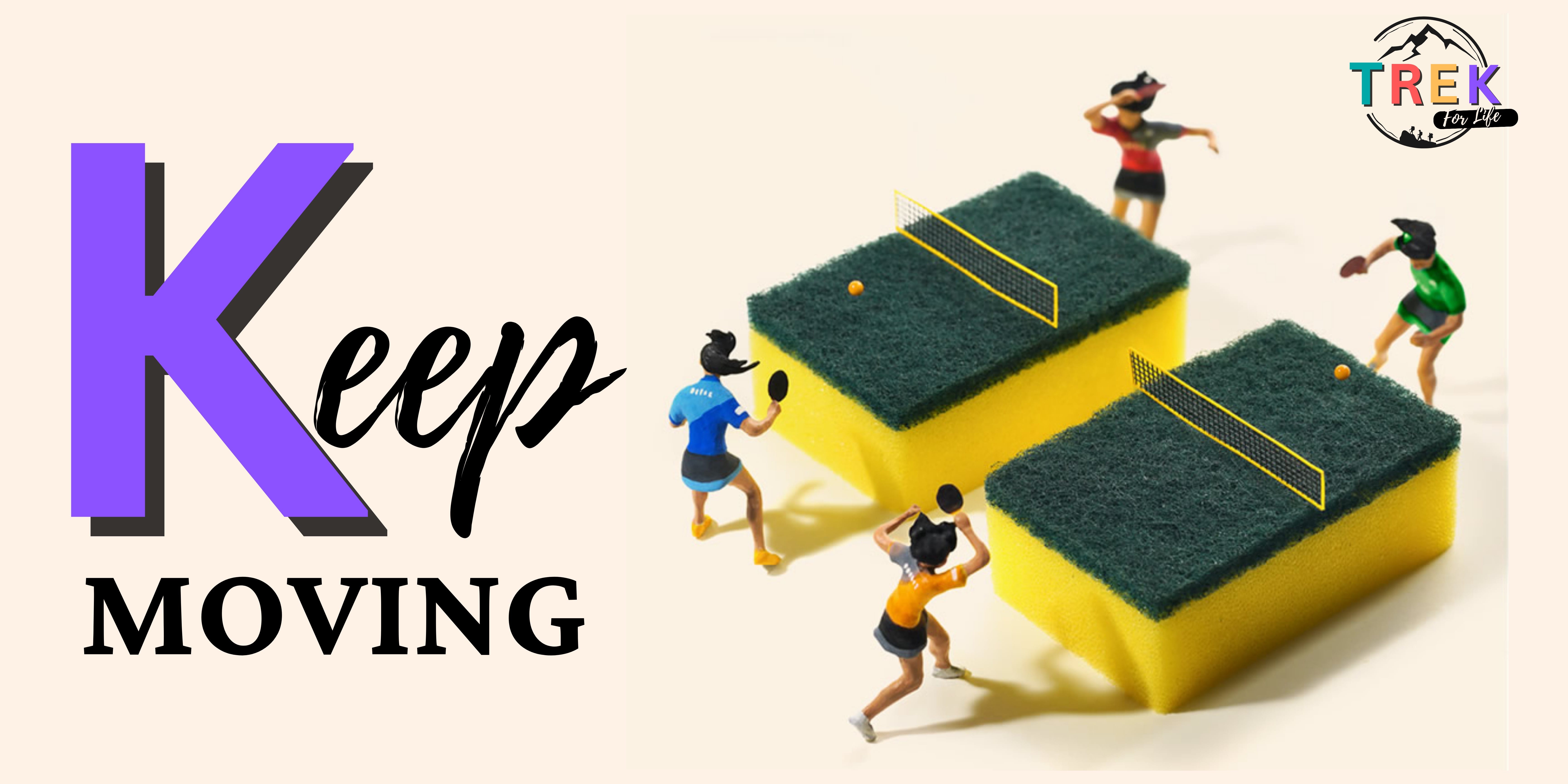 Tiny figurines playing ping pong on yellow kitchen sponges used as tables, with text reading Keep Moving.