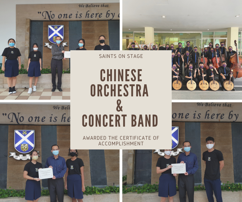 Students receiving certificates of accomplishment for Chinese Orchestra and Concert Band at a Saints on Stage event.