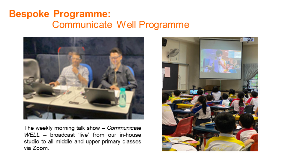 Two men host a talk show in a studio while students in a classroom watch the broadcast on a projector screen.