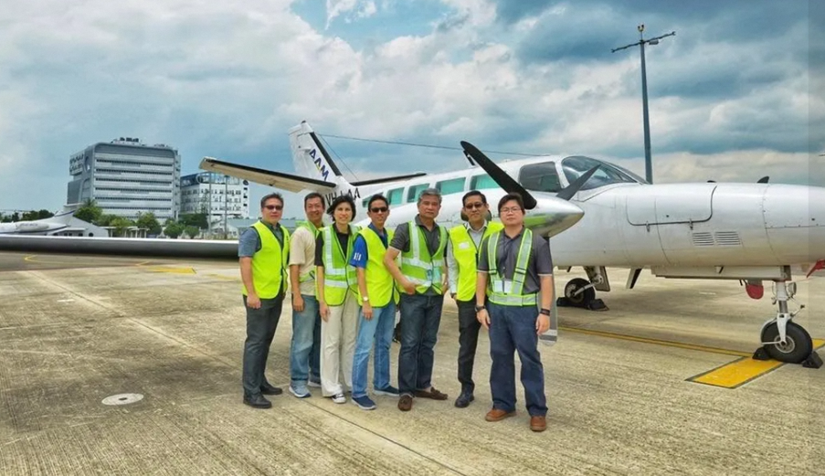 Survey & Geomatics team members with the aircraft used for the second aerial mapping exercise in 2019