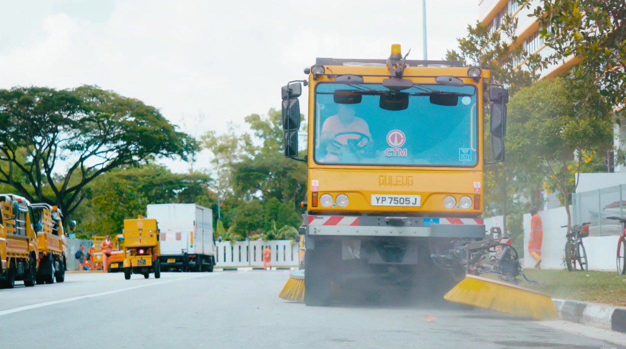 A cleaning vehicle on the road