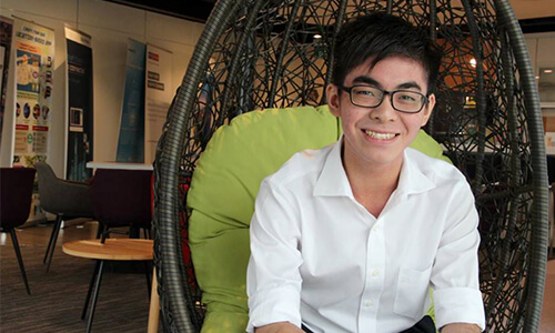 Photo of intern sitting on a chair
