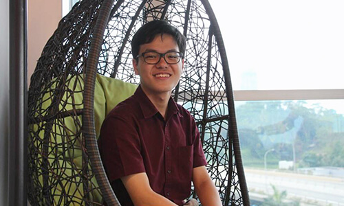 Photo of intern sitting on a chair