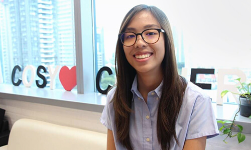 Photo of intern sitting on a chair