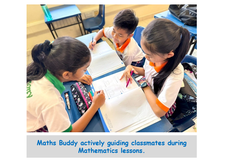 Three young students in school uniforms collaborate over worksheets at a classroom desk.