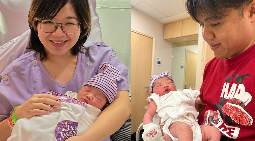 Parents holding their newborn baby in a hospital room shortly after birth