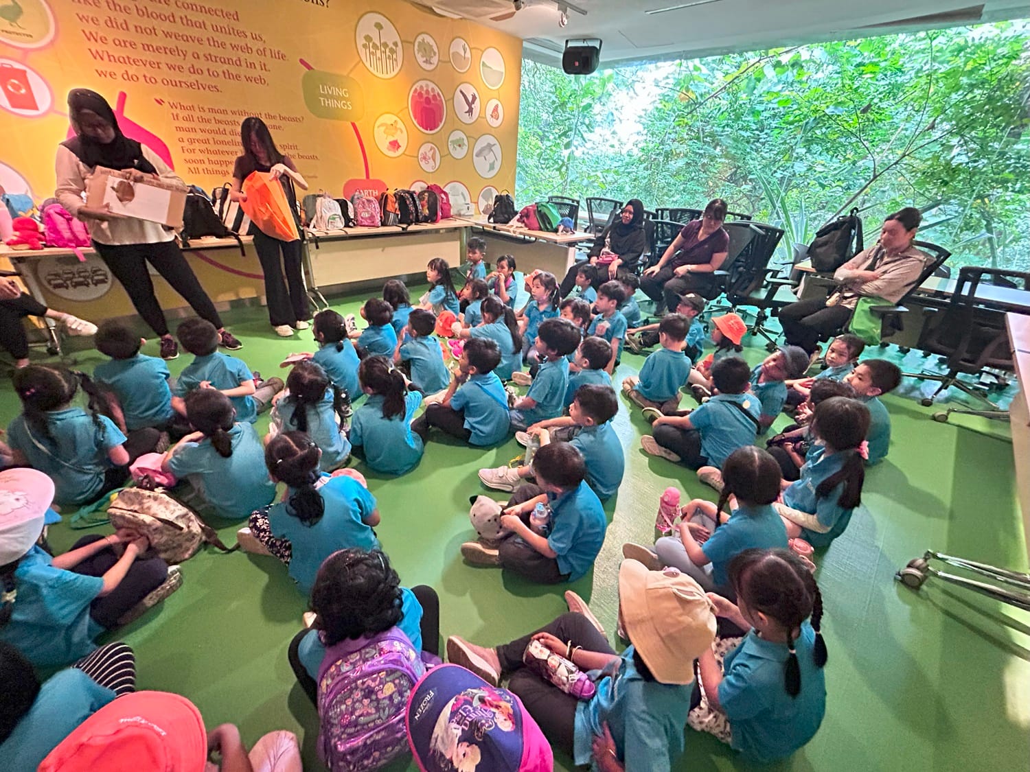 After the trail, the guide led a discussion with the children about the importance of rainforests. The children also participated in an activity using items the guide had collected along the trail, determining whether they could be recycled. This reinforced the importance of the 3Rs (Reduce, Reuse, Recycle).