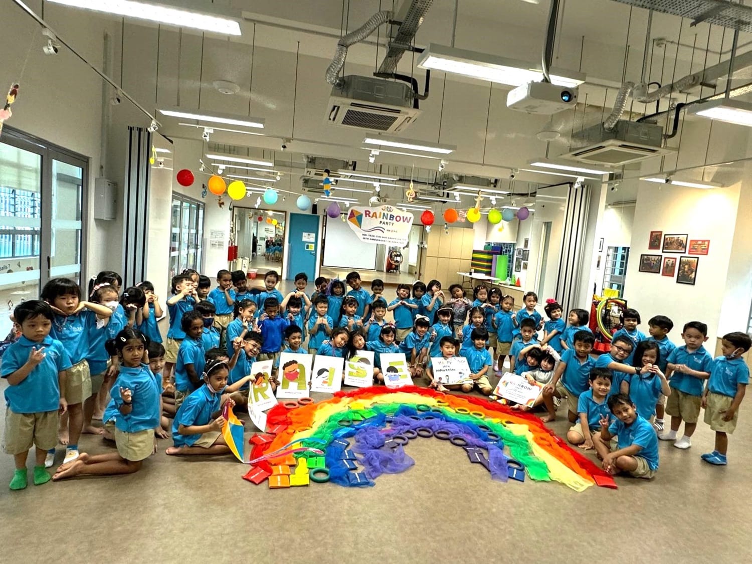 After gathering the rainbow-coloured items, the children worked cooperatively to arrange them into the 7 colours of the rainbow. They had a wonderful time putting them together!