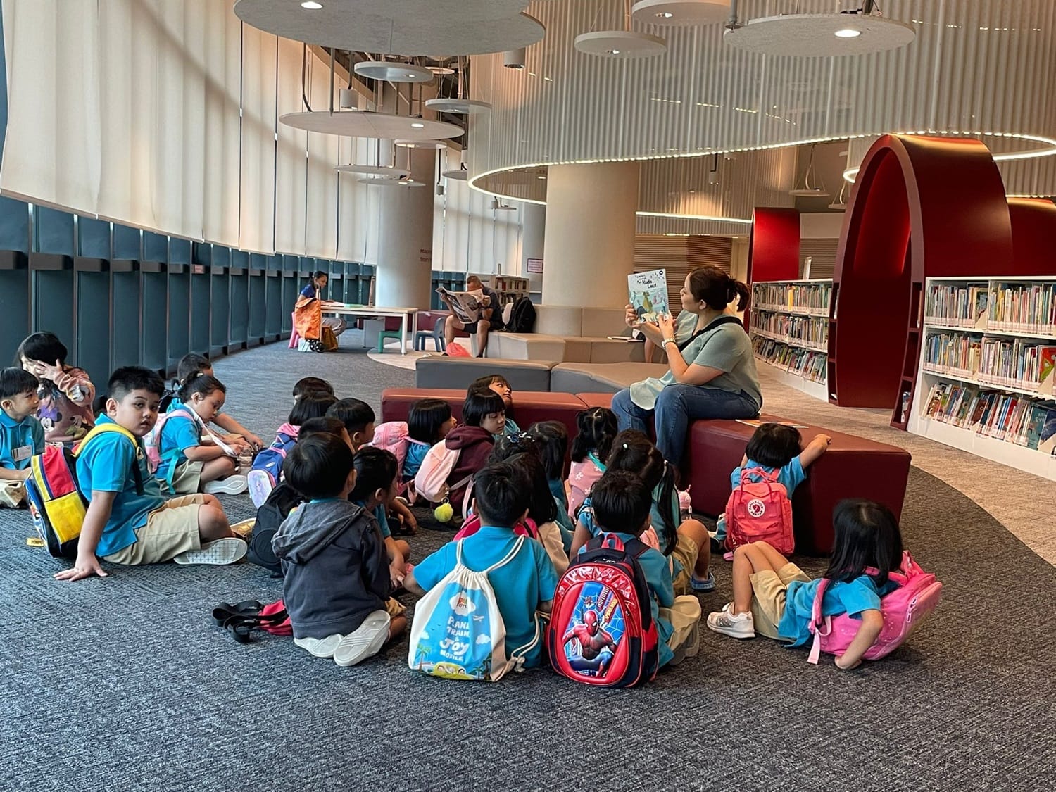 The children enjoyed a story telling session after exploring books of different languages available in the library.