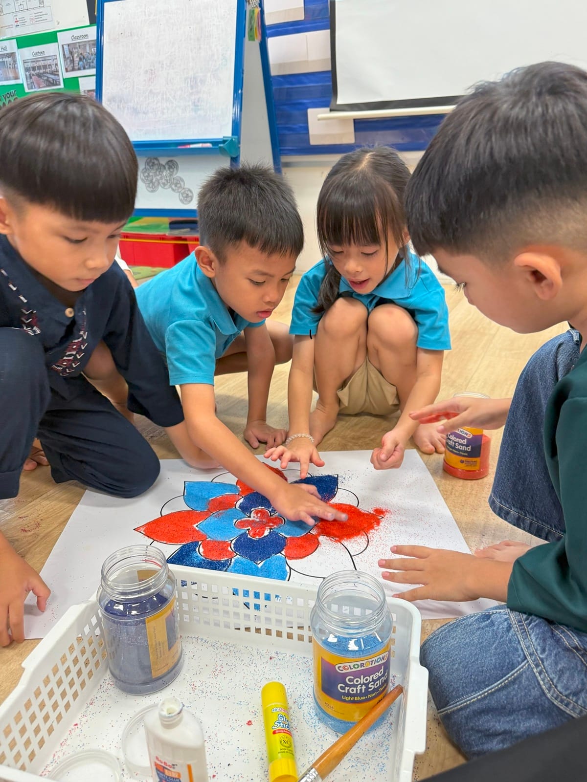 As a class, our young artists worked together to design a colourful rangoli, carefully placing bright coloured sand to form patterns symbolising joy and good fortune. Children also crafted their own paper diyas (oil lamps), learning how lights represent hope and kindness.