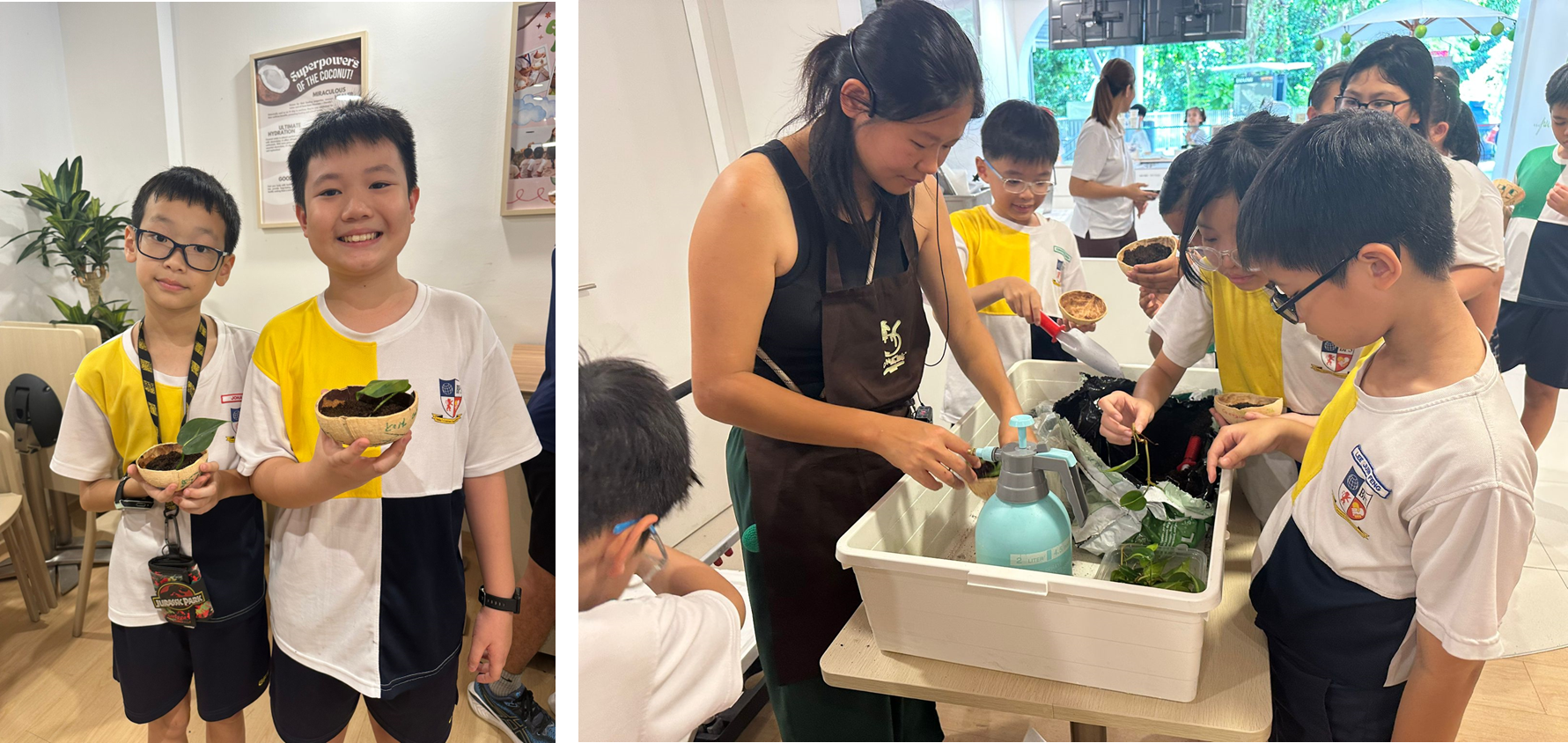 Two boys hold small potted plants while other children gather around a woman in an apron doing a planting activity indoors.