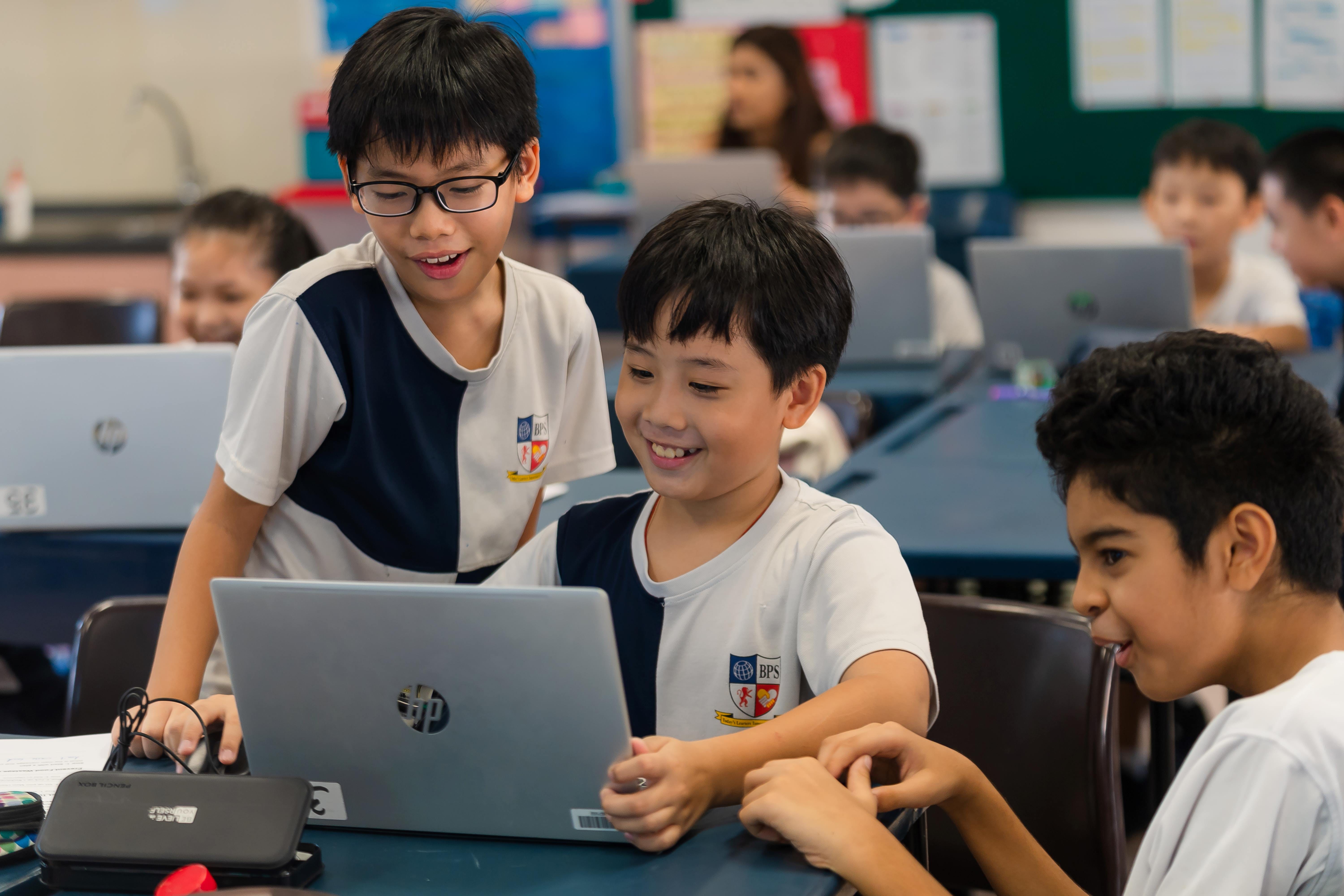 Students engaged with online class activities
