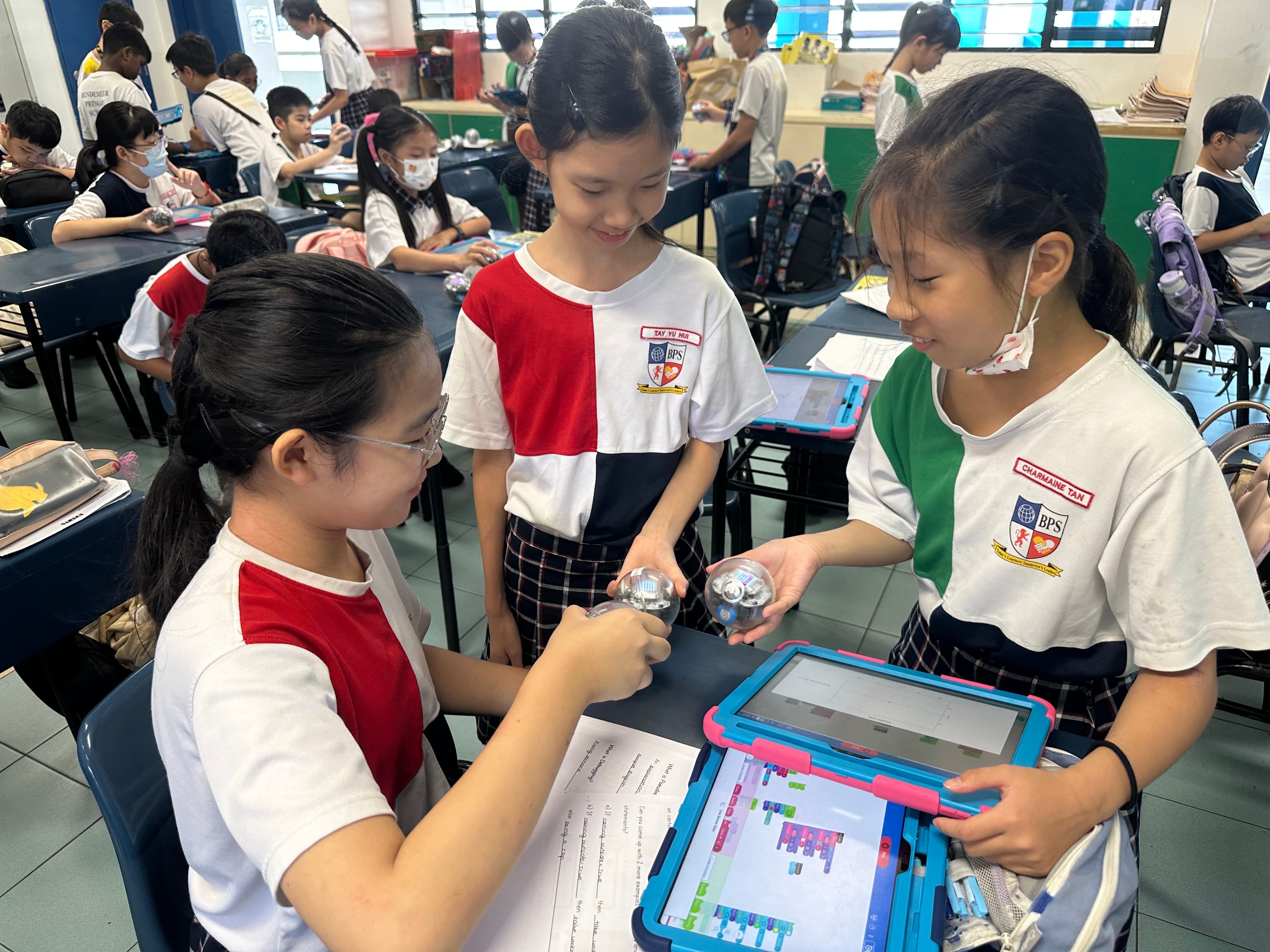 P5 Students working on dance program using their Sphero robotic kits