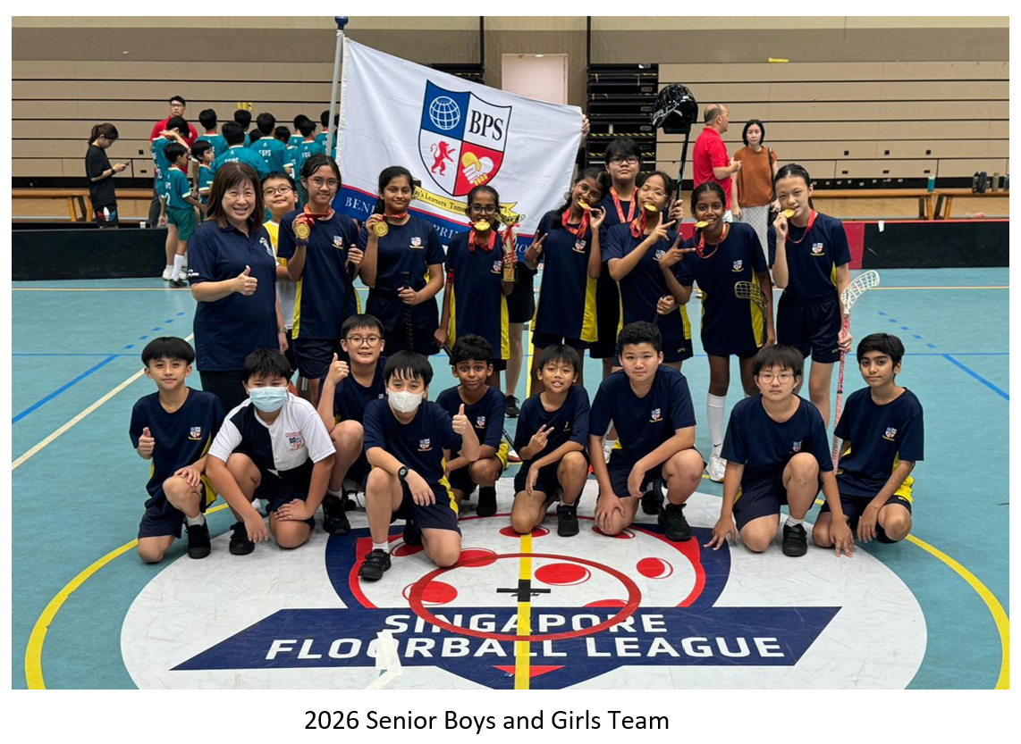 BPS school floorball team posing with medals and a BPS flag on a Singapore Floorball League court.