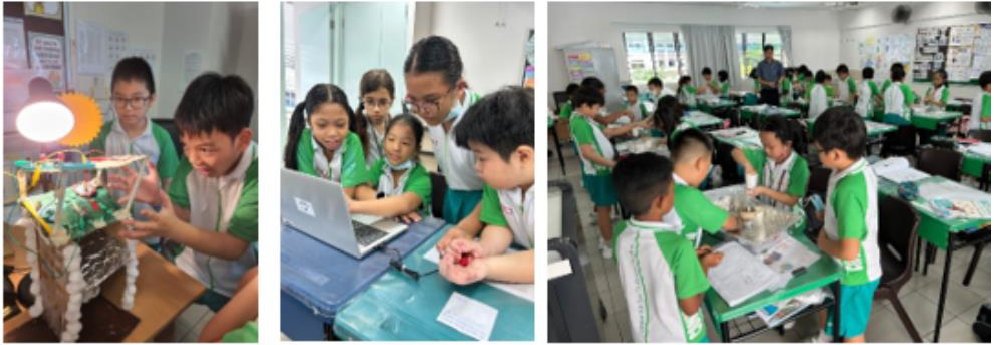 Students in green uniforms work on hands-on STEM projects including a model, laptop, and experiments in a classroom.