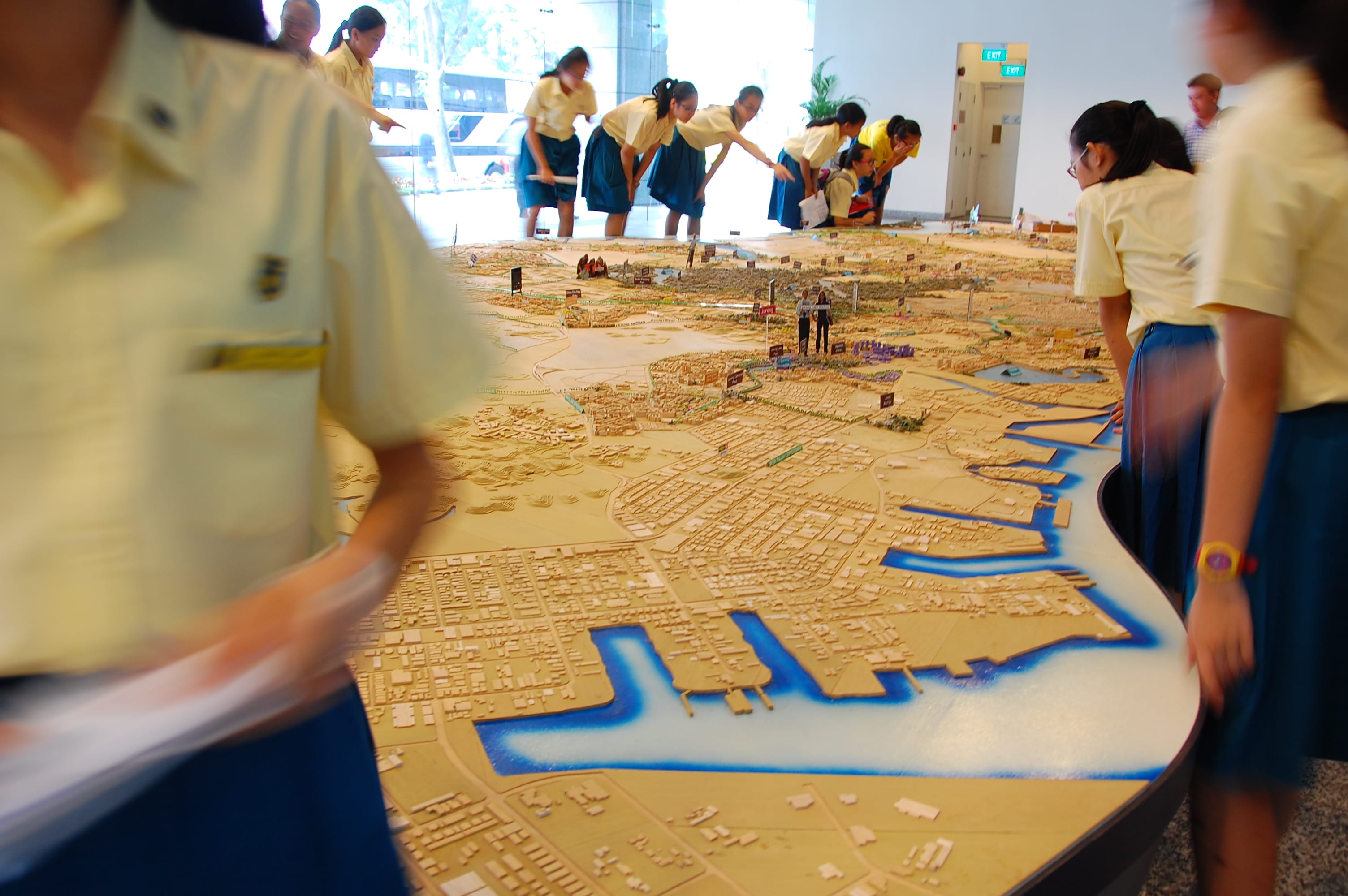 Student looking at large detailed scale city model