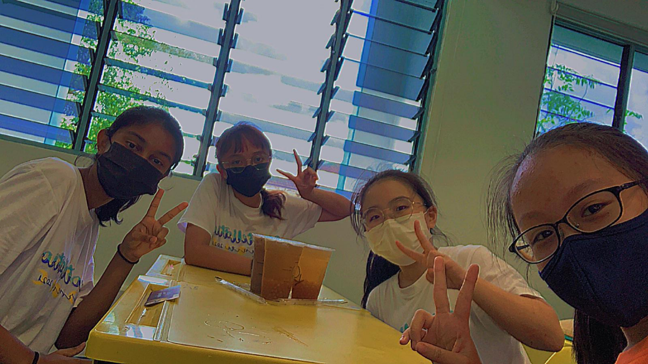 Student in mask gathering for crezpicnic in their own classroom