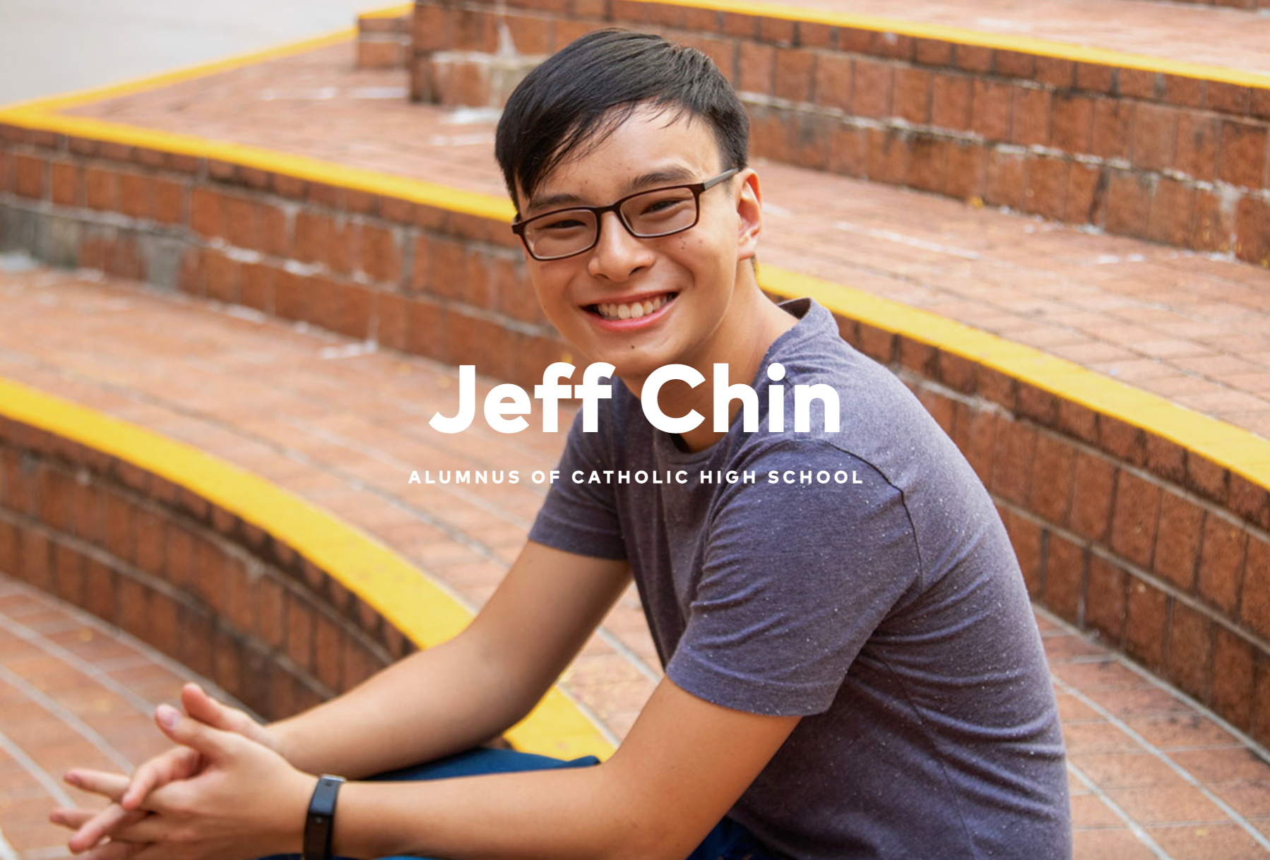 Smiling young man with glasses sitting on brick steps, labeled Jeff Chin, Alumnus of Catholic High School.