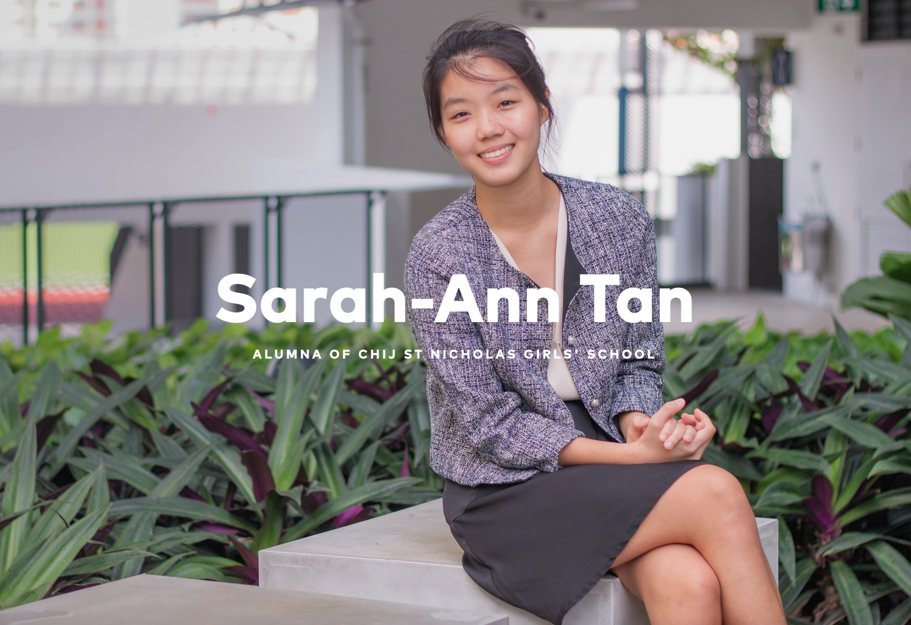 Smiling woman seated on steps by plants, with text Sarah-Ann Tan and alumna of CHIJ St Nicholas Girls' School.