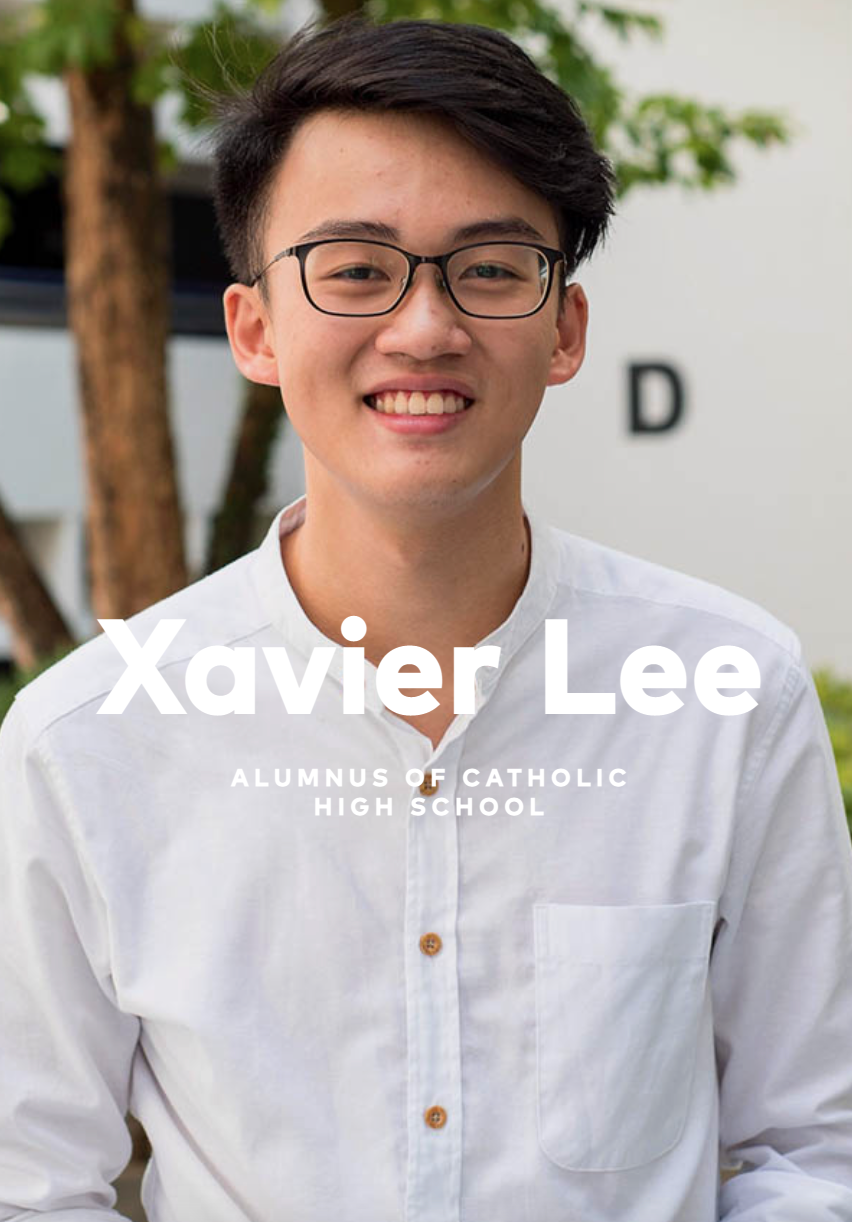 Young man named Xavier Lee, alumnus of Catholic High School, wearing glasses and a white shirt, smiling outdoors.