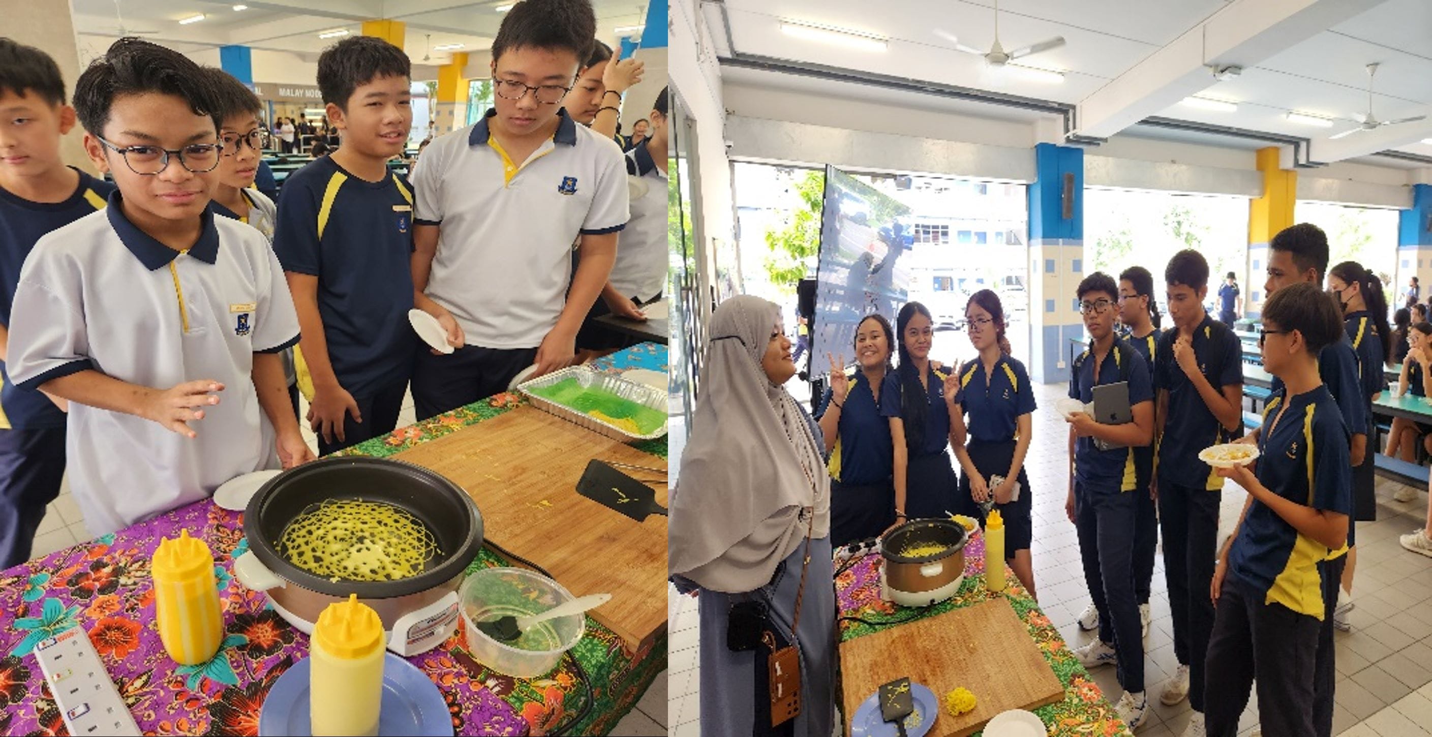 School students in uniforms gathered around a food demonstration table with a cooking pot and squeeze bottles.