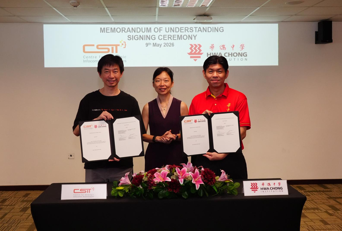 Understanding (MOU) between CSIT and HCI, witnessed by MOS Lau. This partnership is a major milestone in advancing cybersecurity and AI education in Singapore, bringing an upgraded lab to HCI.