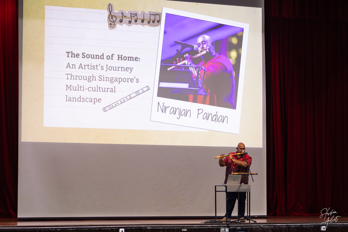 Artist, director, and composer Niranjan Pandian performing on the Indian flute during the C2 Mass CT session.