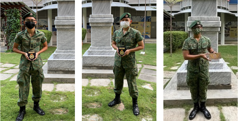 **Short alt text:** Three students in military uniforms pose individually with awards in front of a school monument, recognising their achievements and service.