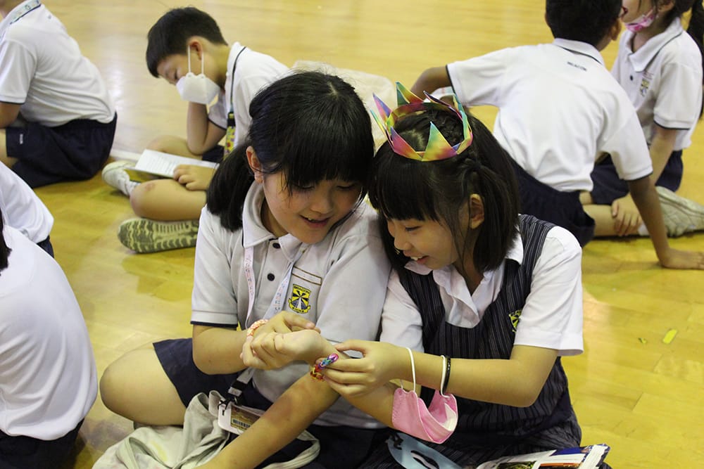 Students interacting during Beacon Gives to support the charities (2022)