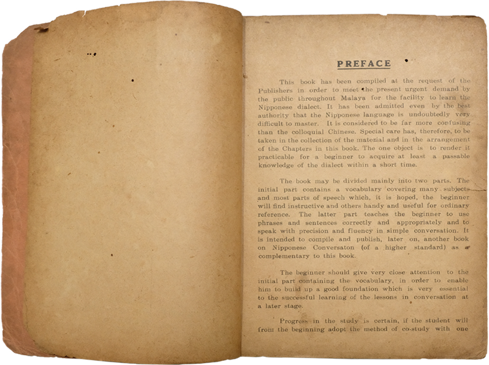Aged open book showing a yellowed preface page about learning the Nipponese dialect in Malaya.
