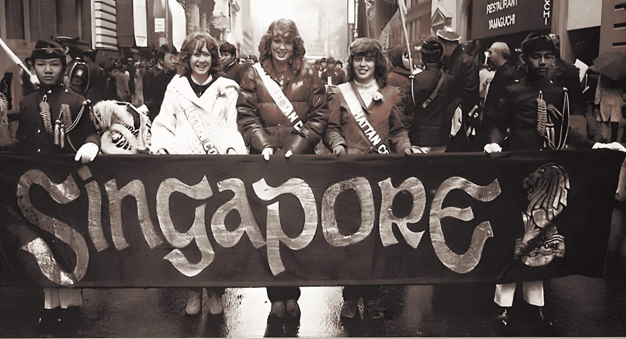 The Band proudly carrying Singapore’s banner.