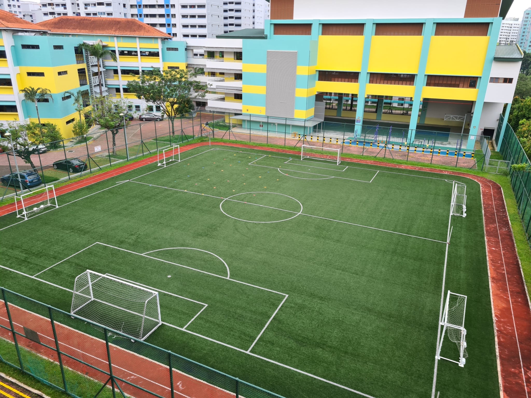 Indoor Sports Hall, school field and playground after PERI Upgrading (2015).