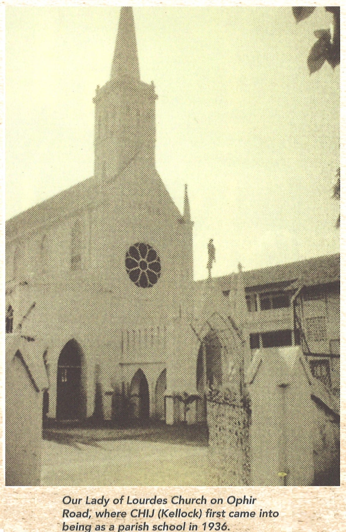 Old black-and-white photo of Our Lady of Lourdes Church on Ophir Road, featuring a tall spire and rose window.