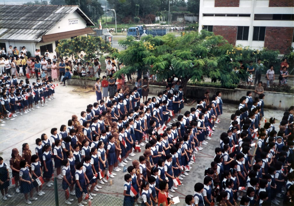 With plans underway for a new extension in 1985, a Singathon was organised to raise funds, while the school was at its holding site at Punggol Road.