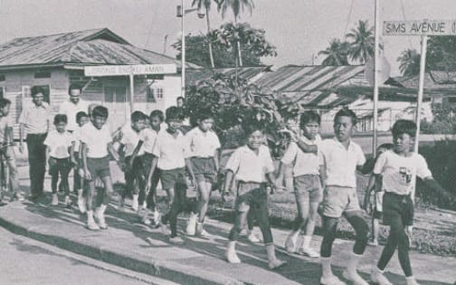 Students of Jalan Daud School raising funds for the Central Library Walkathon.