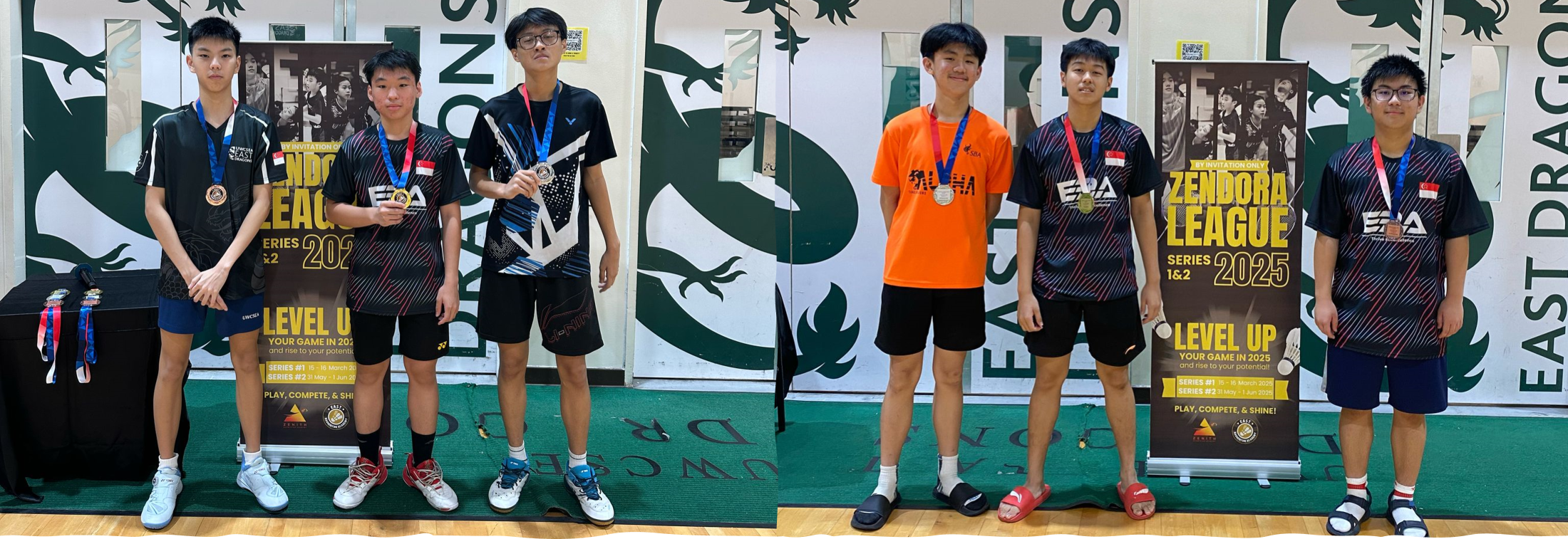 Six young male badminton players wearing medals pose before a Zendora League 2025 banner on a court.