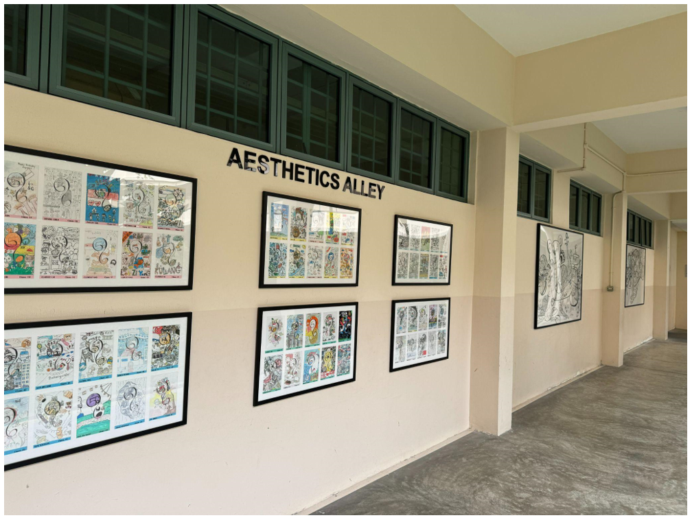 A hallway wall labeled "Aesthetics Alley" displays multiple framed student artwork panels with colorful drawings.