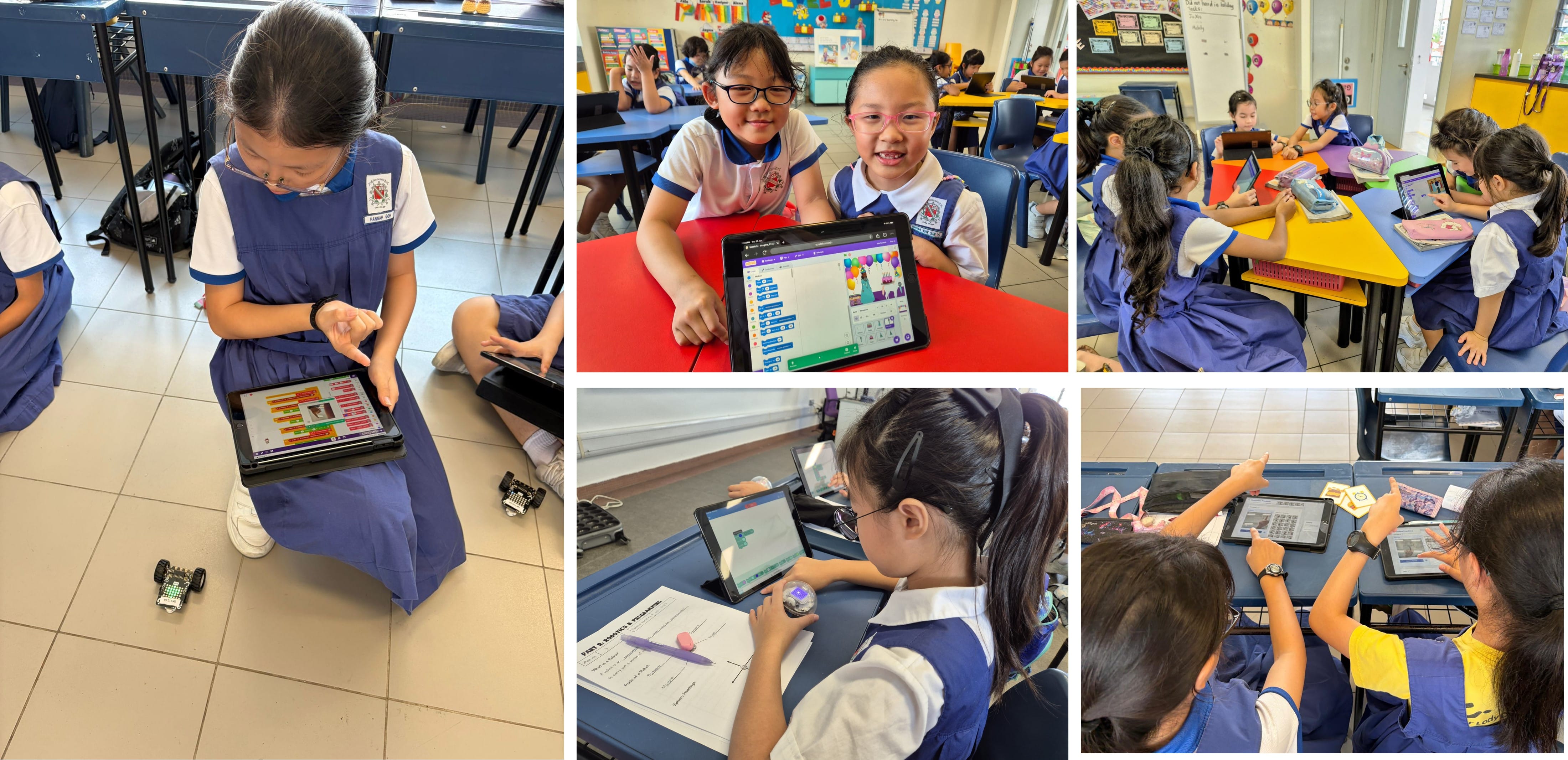 Young girls in blue uniforms use tablets to program small robots in a classroom setting.