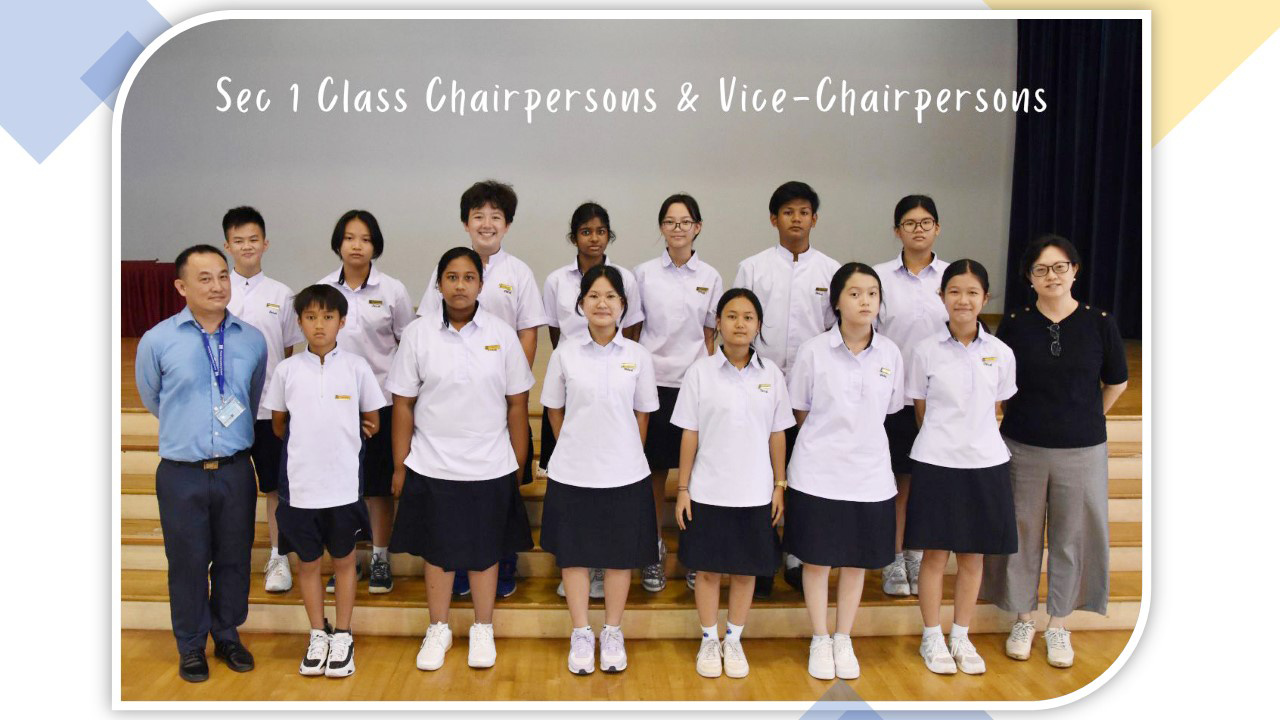 Group photo of Sec 1 Class Chairpersons and Vice-Chairpersons in school uniforms with two adult teachers.