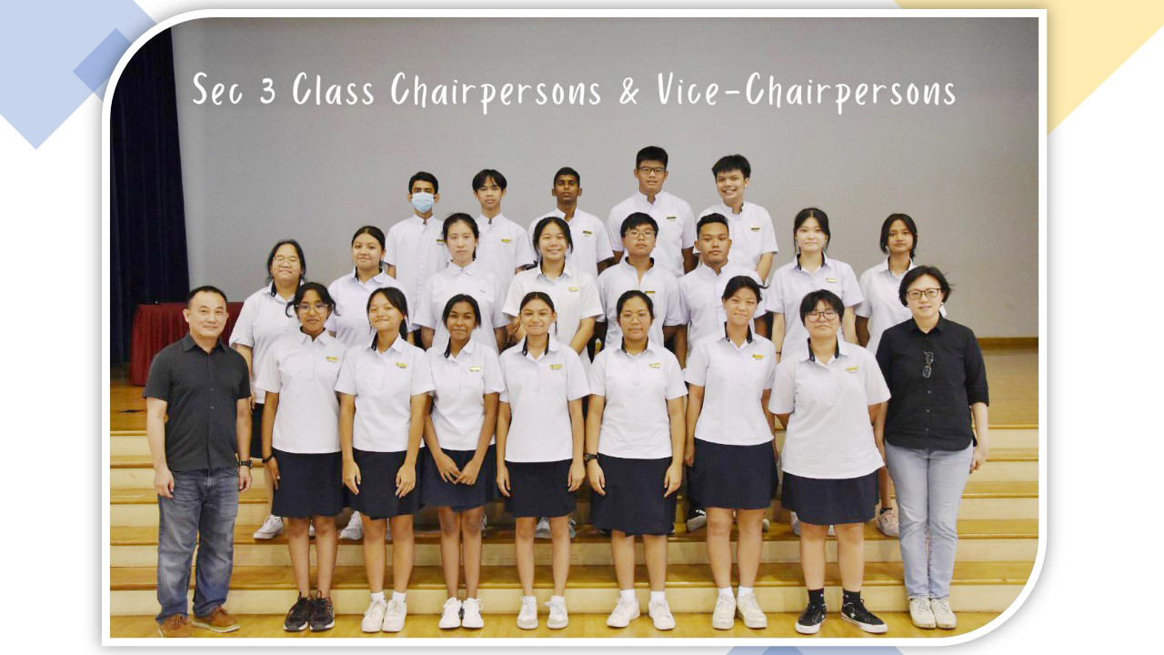Group photo of Sec 3 Class Chairpersons and Vice-Chairpersons in white uniforms with two adult teachers.