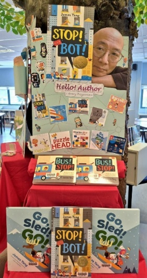 Library display featuring the monthly "Hello Author!" programme, showcasing a selected children's author and a collection of their books to encourage reading.