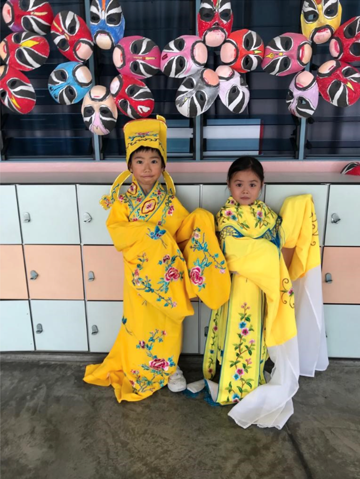 Students dressed in Chinese Opera costumes doing a role-play while reading the STELLAR Story ‘ Chinese Opera’.