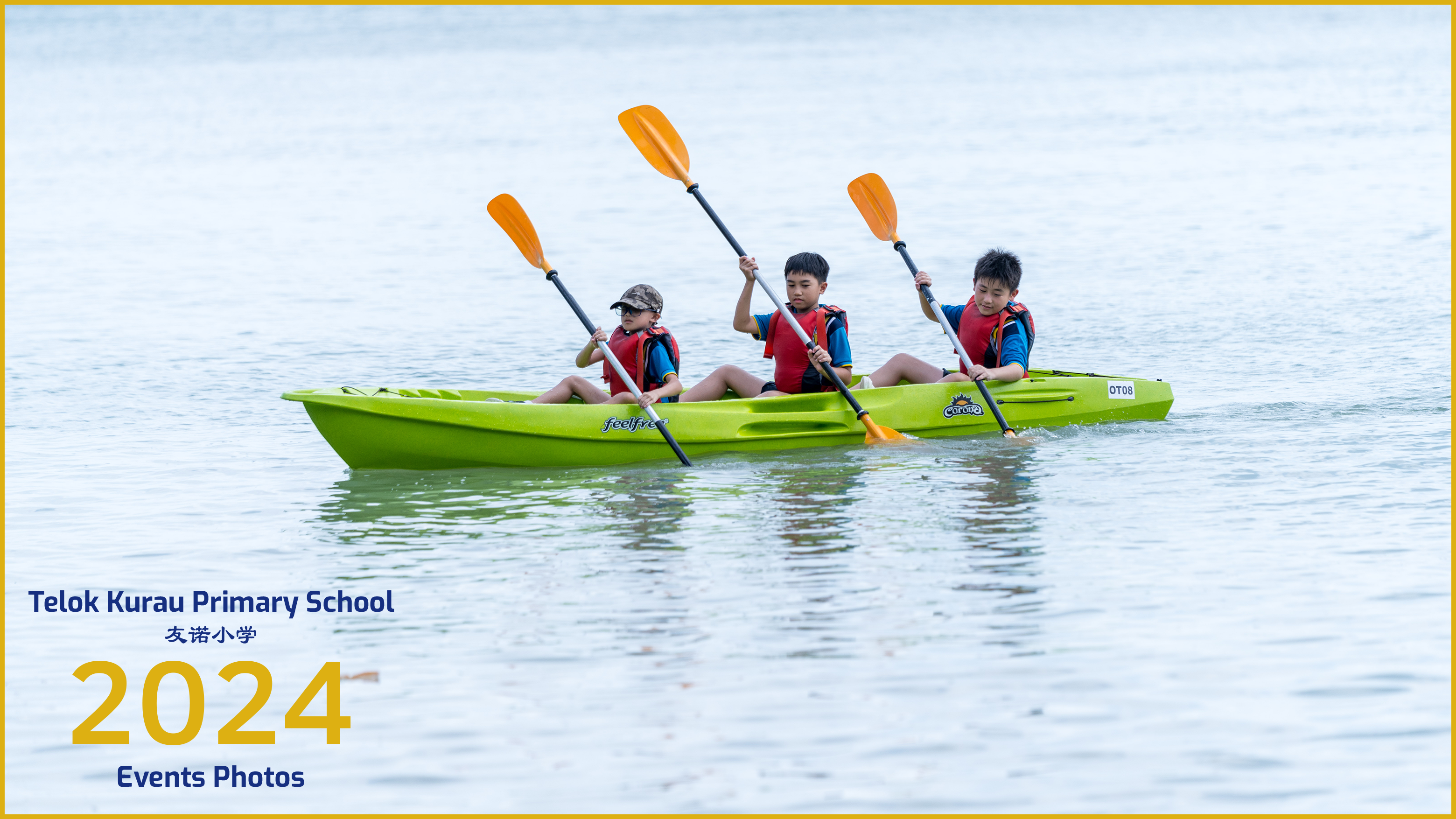 Three children in red life vests paddle a green kayak on calm water, with Telok Kurau Primary School text.