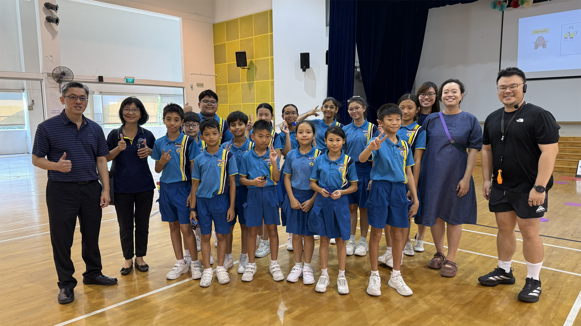 Group photo of TKPS students & staff with Maitri School staff
