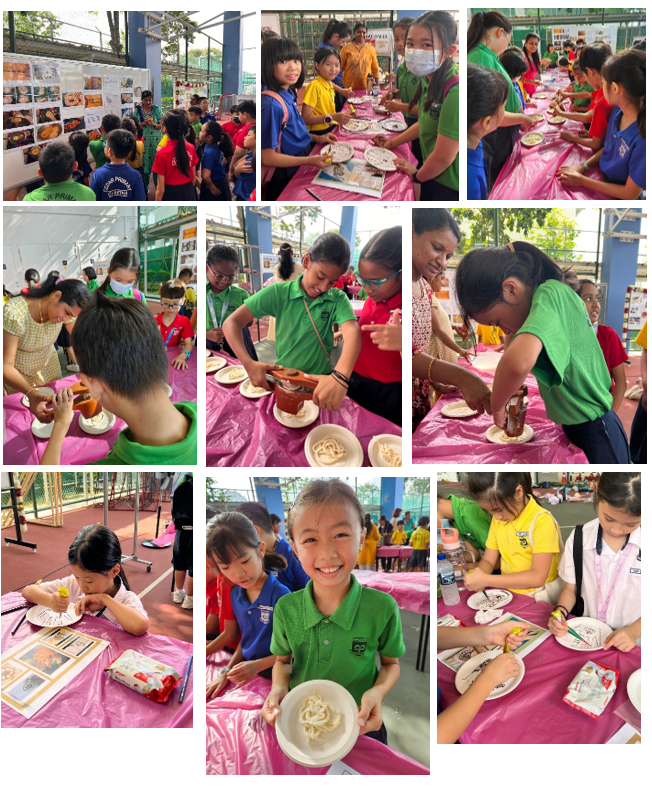 Children in school uniforms participate in a hands-on food activity at pink-covered tables outdoors.