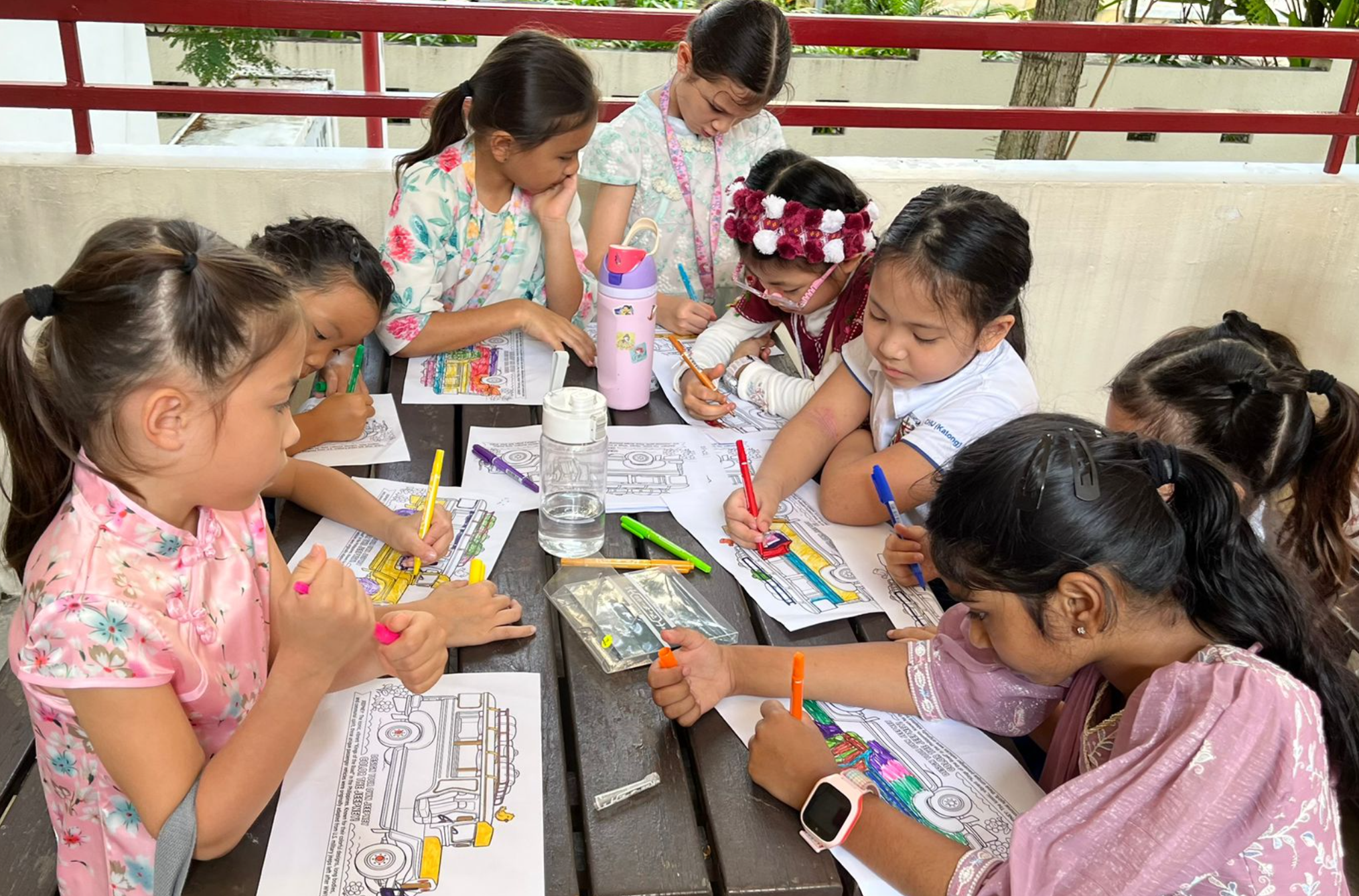 IJ girls colouring activity during Racial Harmony Day