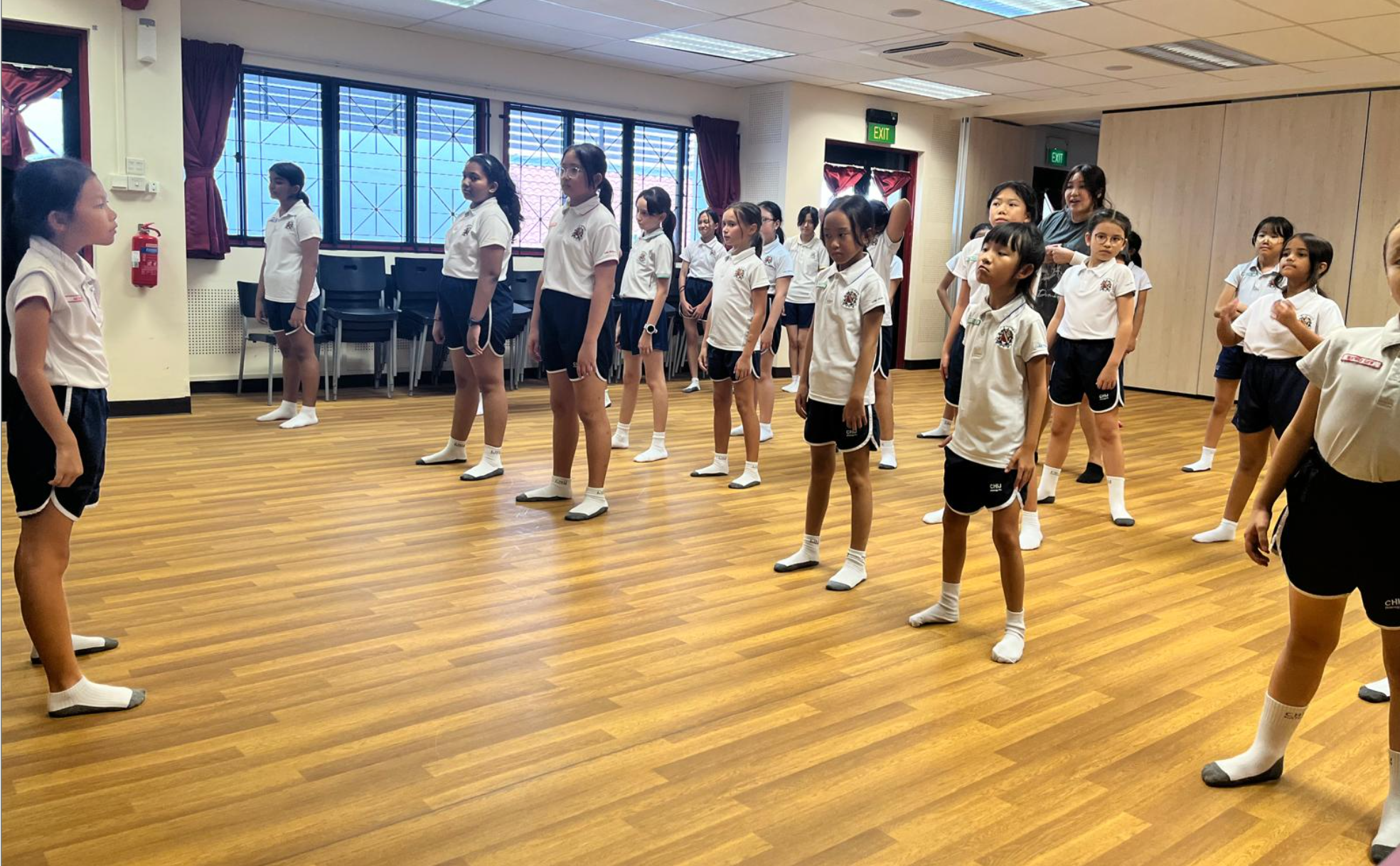 Dance students preparing to warm up