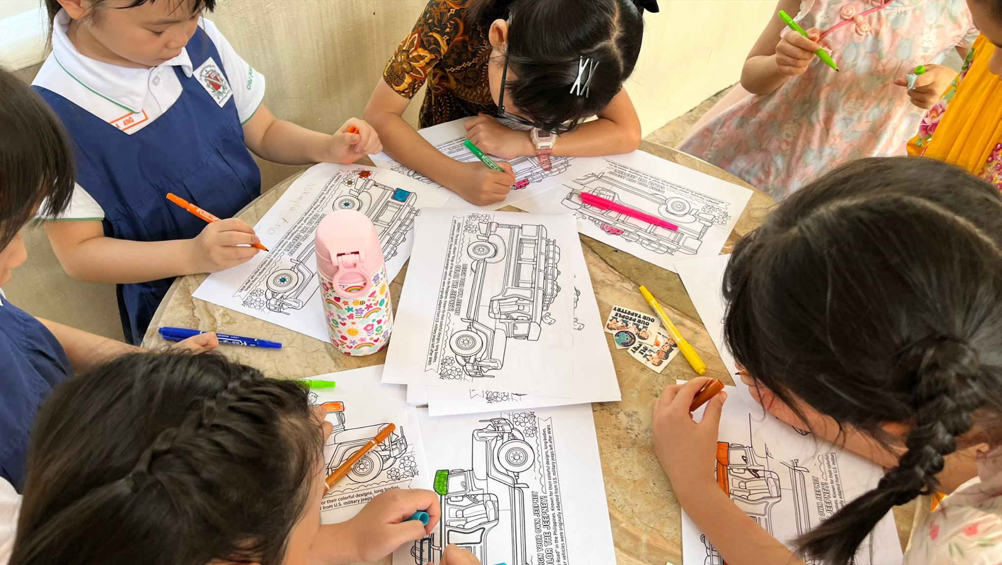 Students colouring together