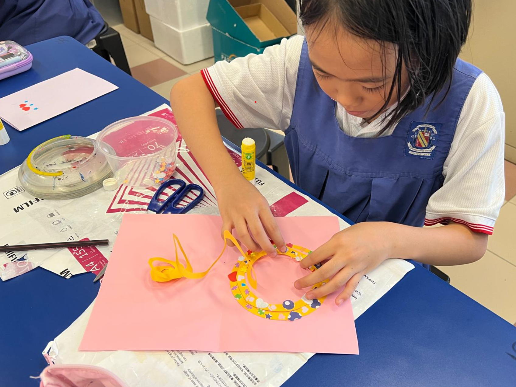Art Club student preparing artwork