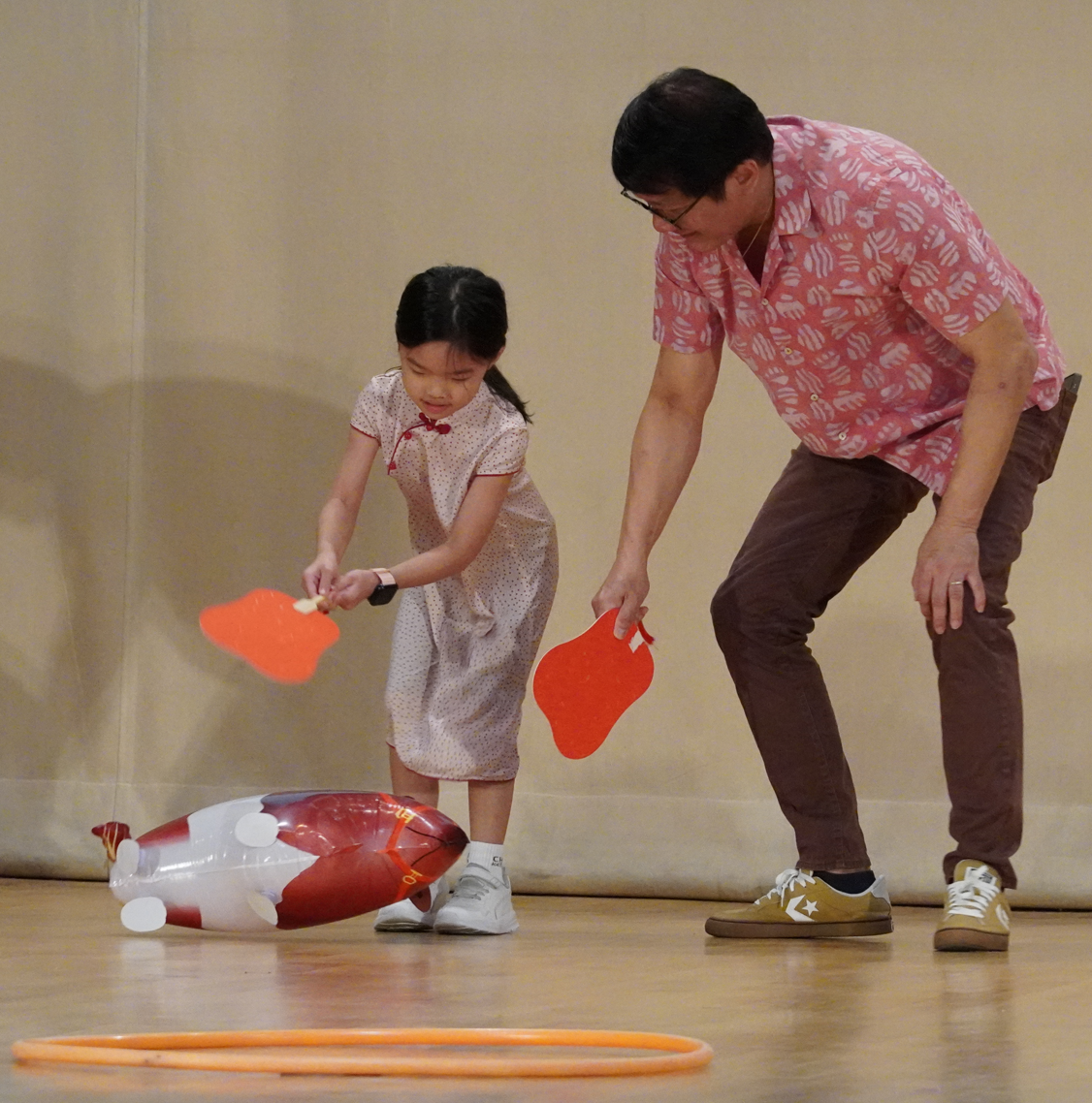 Student and Teacher taking part in interactive game